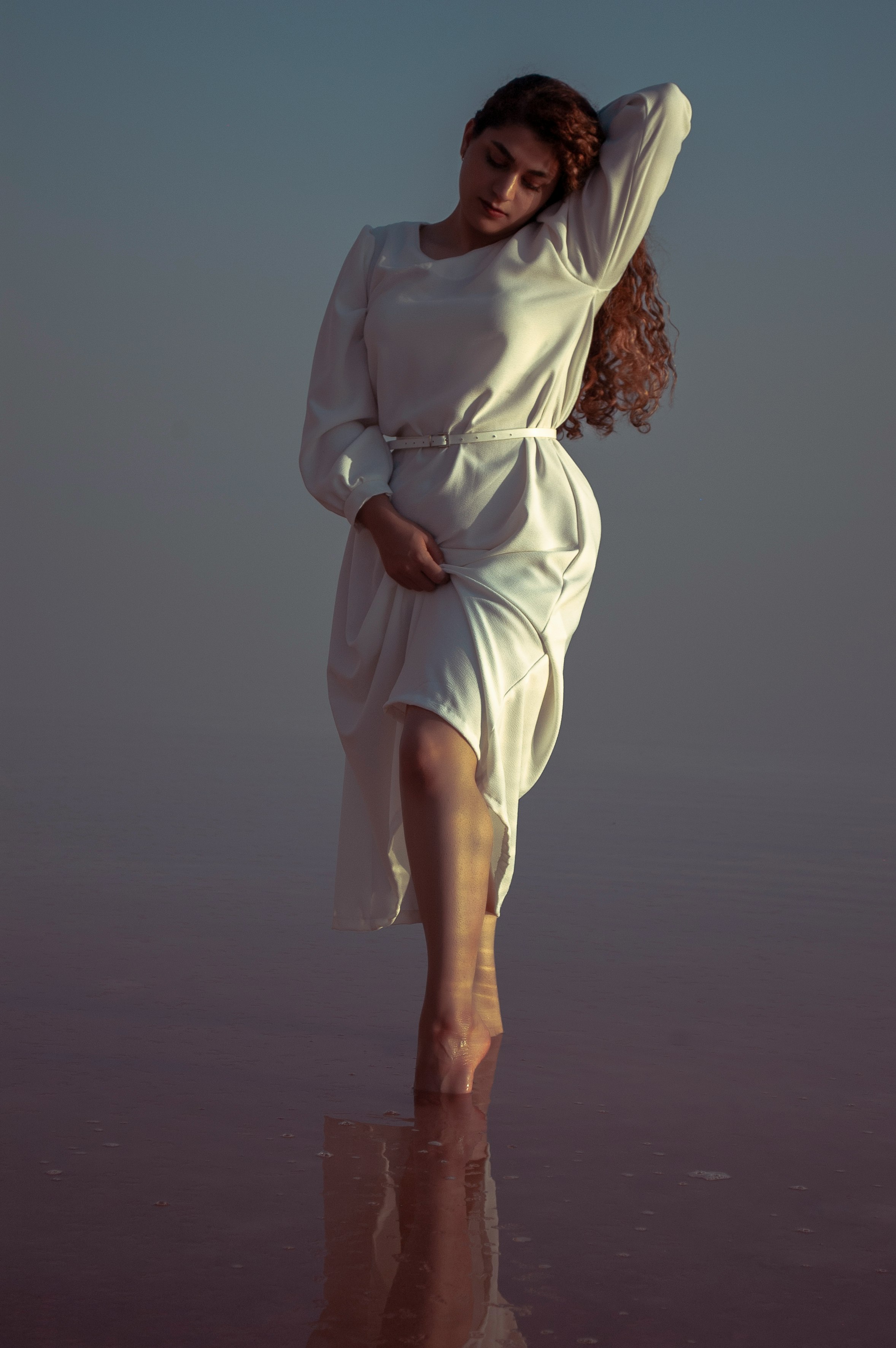 woman in white long sleeve dress